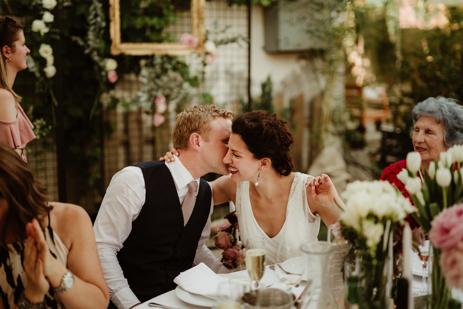 Marijana and Andrew laughing at their wedding reception at Dorćol Platz